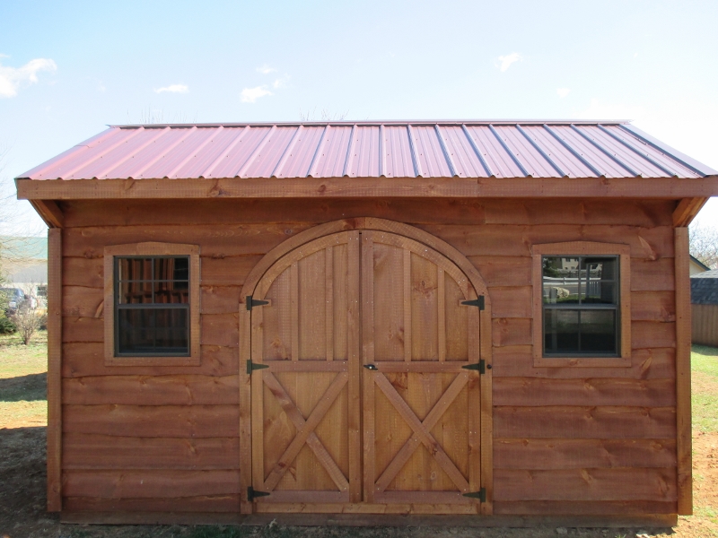 SOLD! SOLD! SOLD! 10x14 Quaker Shed, Rustic Cedar stain, Burgundy metal roof, OPTIONAL FEATURES, Heritage Siding, Arched Top Doors, List price $4,289, DISPLAY MODEL $3,860.10 Chester Springs